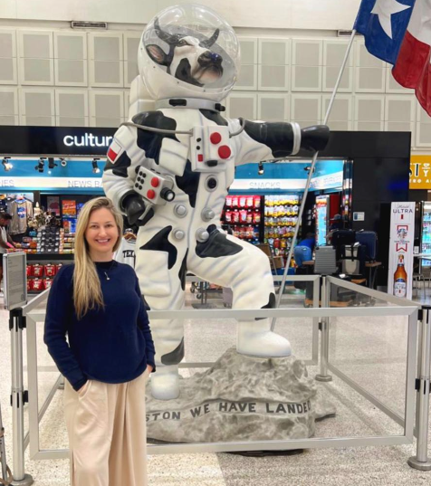 girl standing in George Bush International Airport