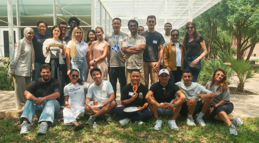 college students gathered outside of a university library
