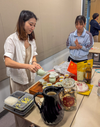 young Chinese woman making traditional Chinese tea