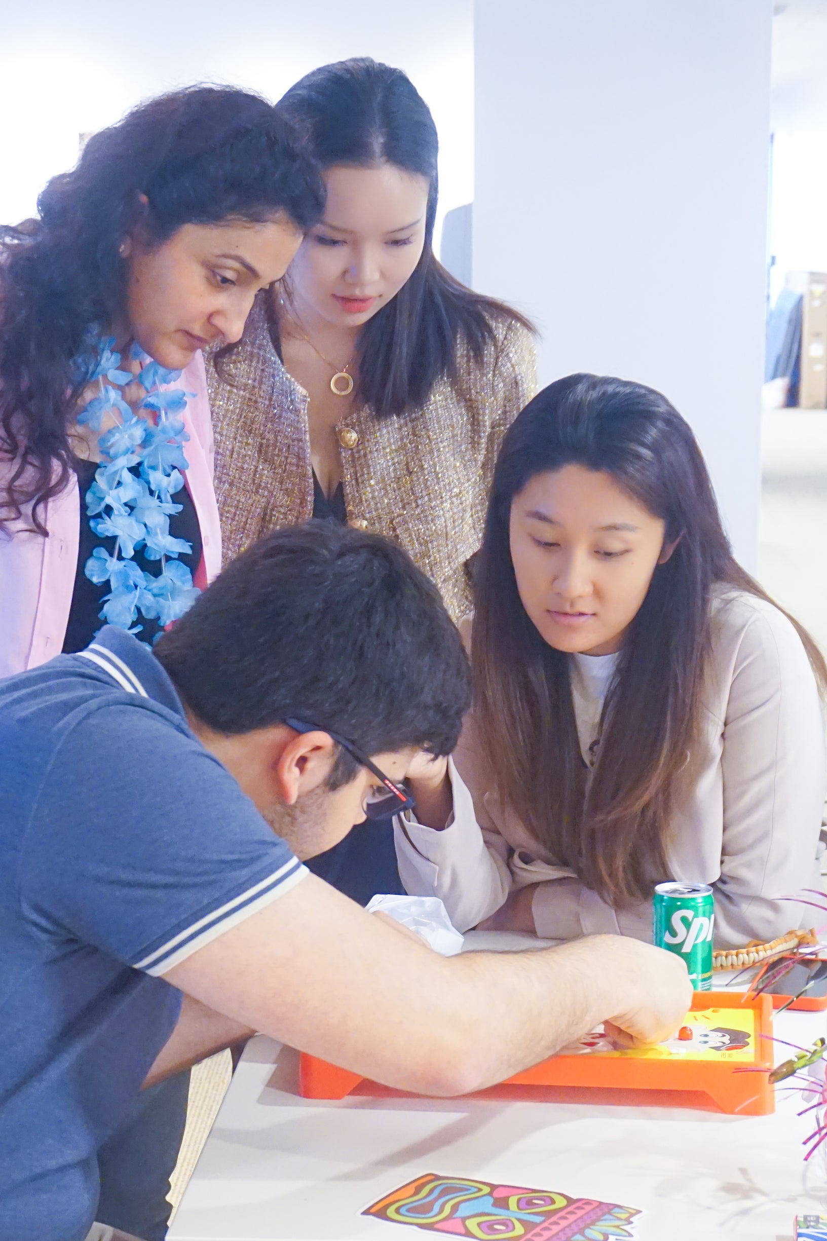 students playing board game