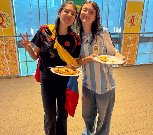 two female college students at international education week party