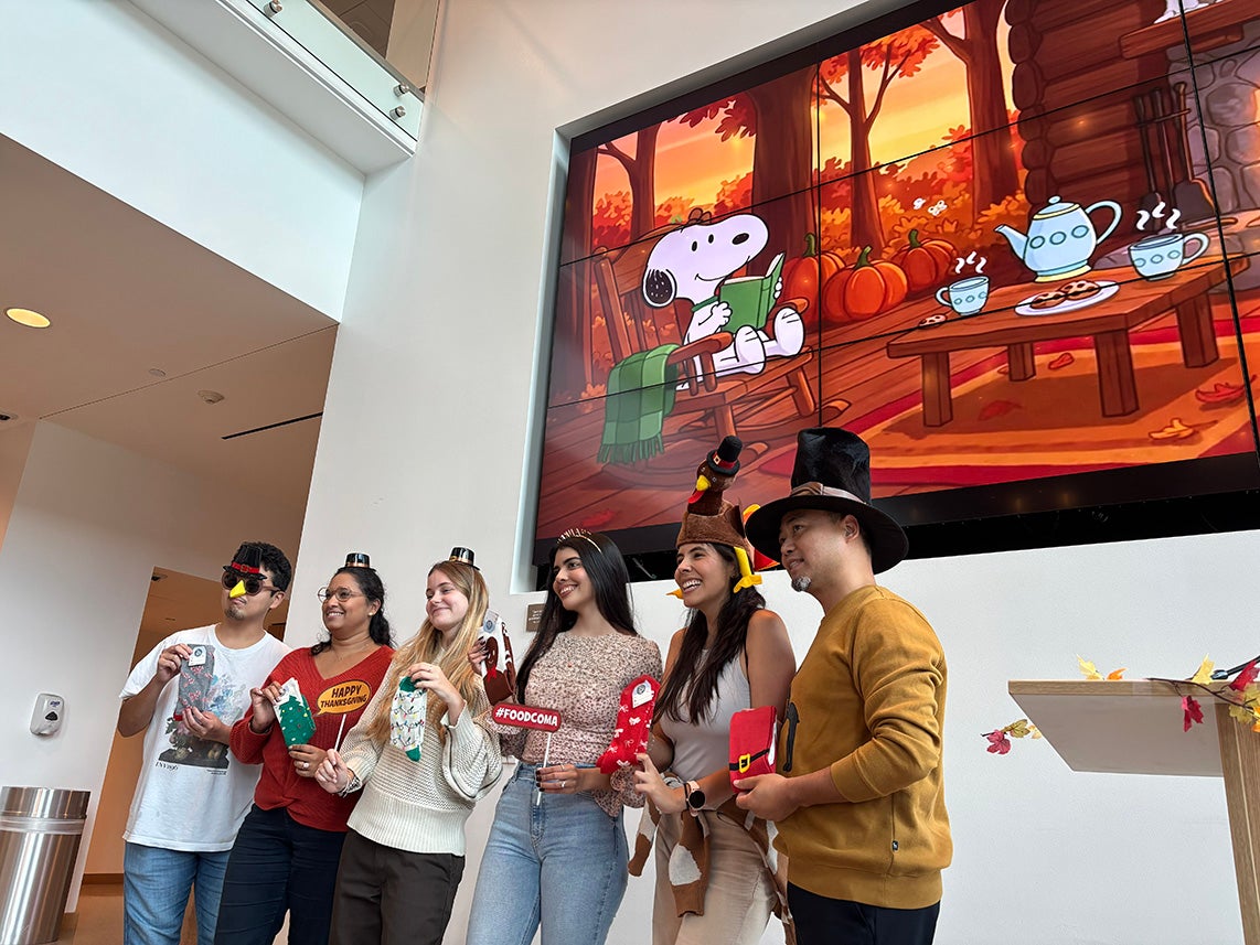 student prize winners wearing Thanksgiving gear