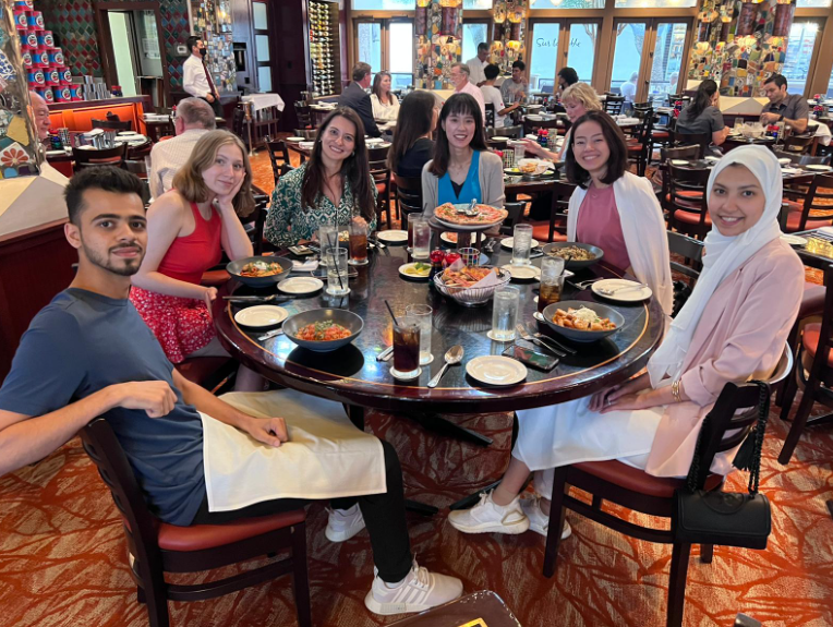 adult students eating together in a restaurant