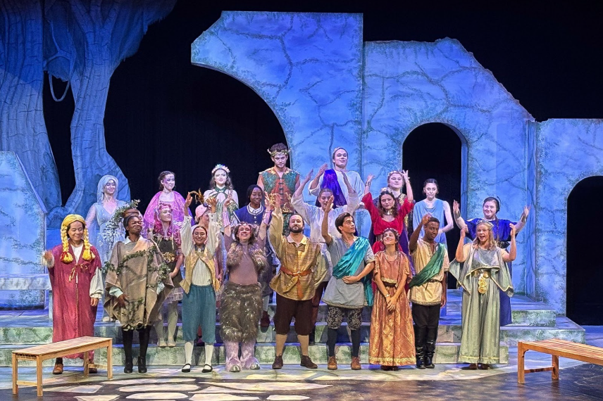college theatre troupe bowing on stage