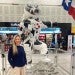 girl standing in George Bush International Airport