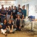 group of adult students together in student lounge at university